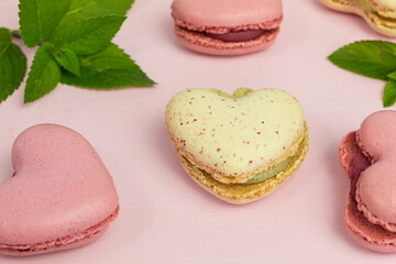 heart shaped macaroons  in pink and pale yellow with mint