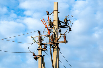 Electricity pole against blue sky background, High voltage electricity pylon