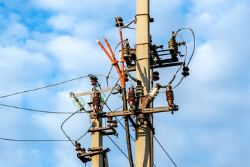 Electricity pole against blue sky background, High voltage electricity pylon