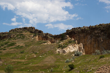 Mountain with stones against a sky