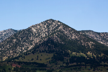 Fototapeta na wymiar Mountain with stones against a sky