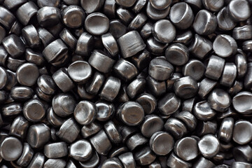 Close-up of plastic polymer granules. hand hold Polymer pellets. polymer plastic. compound polymer.