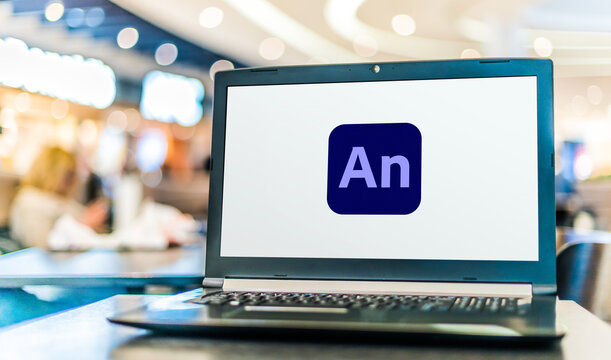 Laptop computer displaying logo of Adobe Animate