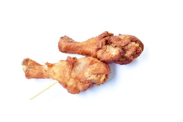 crispy fried chicken drum wing stabbing in wooden stick on white background