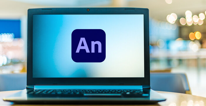 Laptop computer displaying logo of Adobe Animate