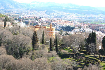 View of Granada city from Alhambra castle, with Sierra Nevada Mountain and the eternal snow, Granada, Andalusia, Spain. 