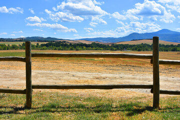 landscape with fence and blue sky