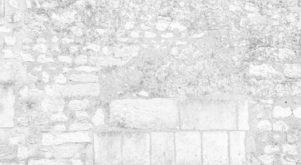 White texture of an old wall made of exposed stones - old vintage texture design - large image in high resolution	