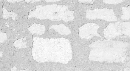 White texture of an old wall made of exposed stones - old vintage texture design - large image in high resolution	