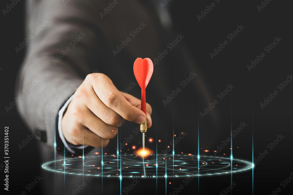 Poster businessman holding and throwing red arrow dart to virtual target dart board. setup objectives and t