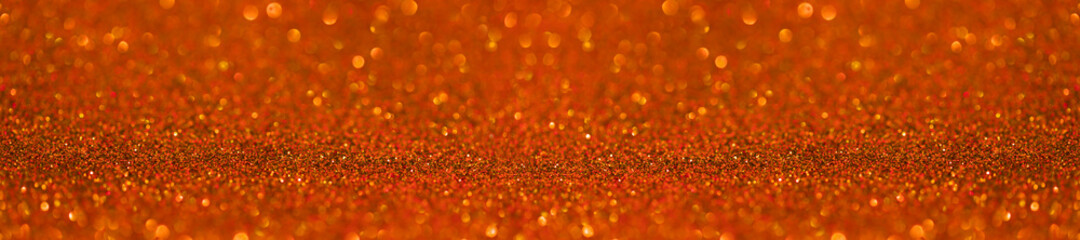 Panorama orange saffron glitter bokeh background