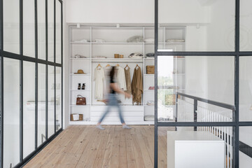 Dressing room with modern and open wardrobe