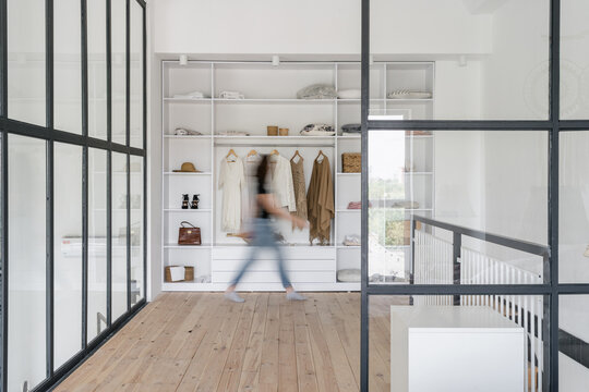 Dressing Room With Modern And Open Wardrobe