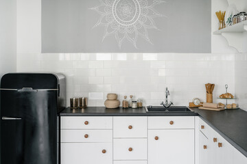 White modern kitchen in new contemporary house