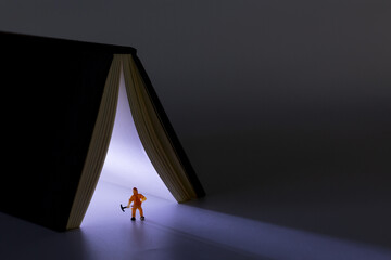 Glowing book and people opened in the night
