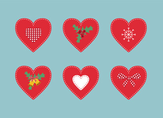 Set of six Christmas decorative patchwork hearts on blue background