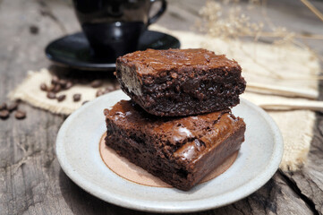 Chocolate Brownies Cake on a gray brown plate. 