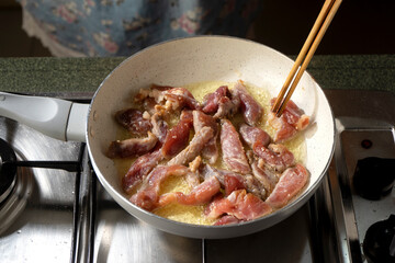 Dried Pork slices are frying