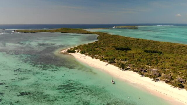 Aerial view of a beautiful turquoise sea called Mer d&rsquo;Emeraude, and its islands with clear blue water, white sand beaches and palm trees, near Di&eacute;go Suarez Antsirananana, Madagascar