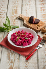 pasta with beet pesto nuts and basil