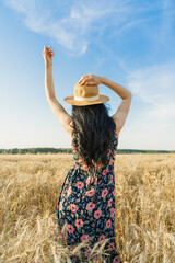 Girl in a field of rye