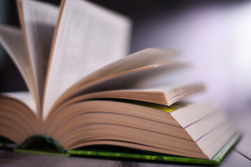 Composition with open book on the table