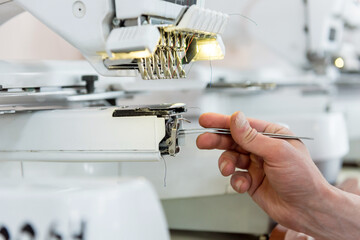 Fabric industry production line. Textile factory. Working tailoring process