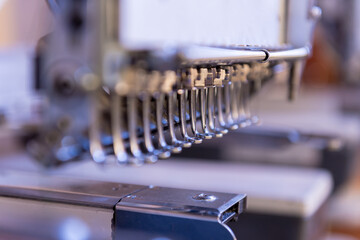 Fabric industry production line. Textile factory. Working tailoring process