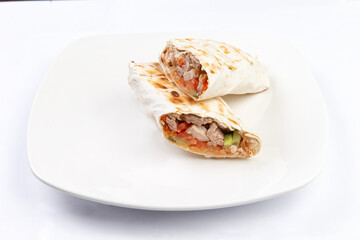 Shawarma sandwich gyro fresh roll of lavash, pita bread RecipeTin Eatsfilled with grilled meat, mushrooms, cheese.