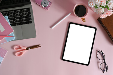 Mockup tablet with blank screen and laptop computer by various feminine equipment on female...