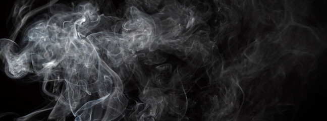 Obraz premium Smoke isolated on black background. Movement of white smoke