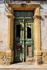 Fototapeta na wymiar Colourful Venetian door in the old town of Nicosia, Cyprus