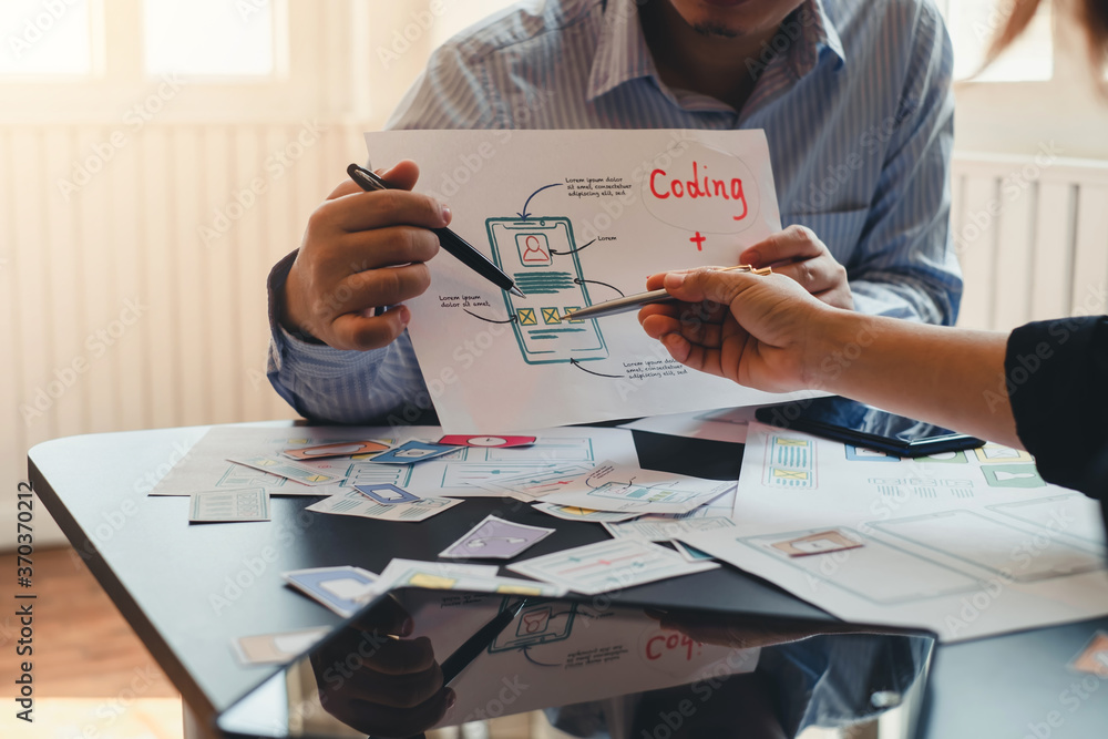 Aufkleber ui ux graphic designer. group of designer creativity drawing a website outline and website ux app de