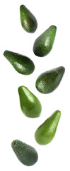 Fresh ripe avocados falling on white background