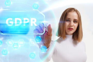 Business, Technology, Internet and network concept. Young businessman working on a virtual screen of the future and sees the inscription: GDPR