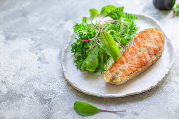 fried salmon steak piece of fillet fish seafood natural product ingredient second course organic eating healthy top view place for text copy space keto or paleo diet raw pescetarian