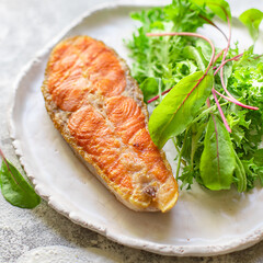 fried salmon steak piece of fillet fish seafood natural product ingredient second course organic eating healthy top view place for text copy space keto or paleo diet raw pescetarian