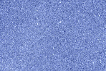 Colored paper background with sequins