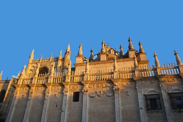 Fototapeta na wymiar Facade of Catedral de Sevilla, Spain in sunrise