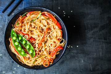 rice noodles with vegetables cellophane pasta natural product
ingredient second course food background top view copy space for text organic eating healthy