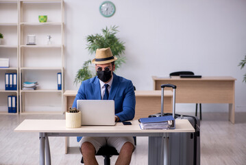 Businessman preparing for trip during pandemic