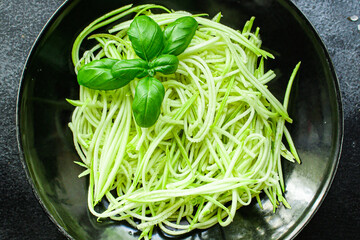 zucchini spaghetti salad vegetable snack natural product
ingredient food background top view copy space for text organic eating healthy keto or paleo diet raw