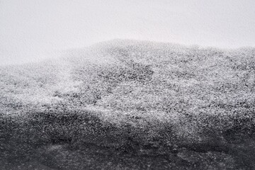 abstract black and white snow surface for background or wallpaper on the computer's raob table
