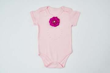Baby clothes on a white background. Newborn baby clothing