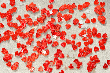 Red hearts on a grey background