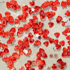 Red hearts on a grey background