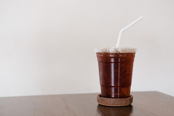 A glass of ice black coffee in coffee cafe