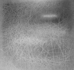 Abrasive metal surface with chaotic scratches