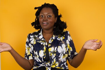 So what? Portrait of arrogant unbothered good-looking modern young stylish woman, shrugging...