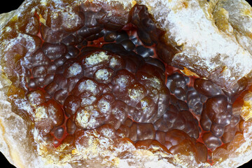 Kidney-shaped chalcedony on quartz close up

